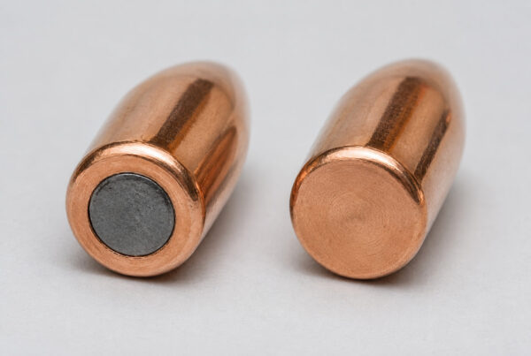 The exposed lead core of an FMJ and the enclosed copper base of a TMJ, showing the differences between TMJ and FMJ bullets.